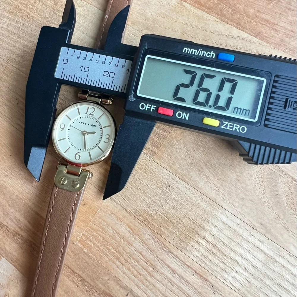 Anne Klein ladies round brown leather dress watch NEW BATTERY